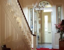 Entrance hall with a hand printed wallpaper